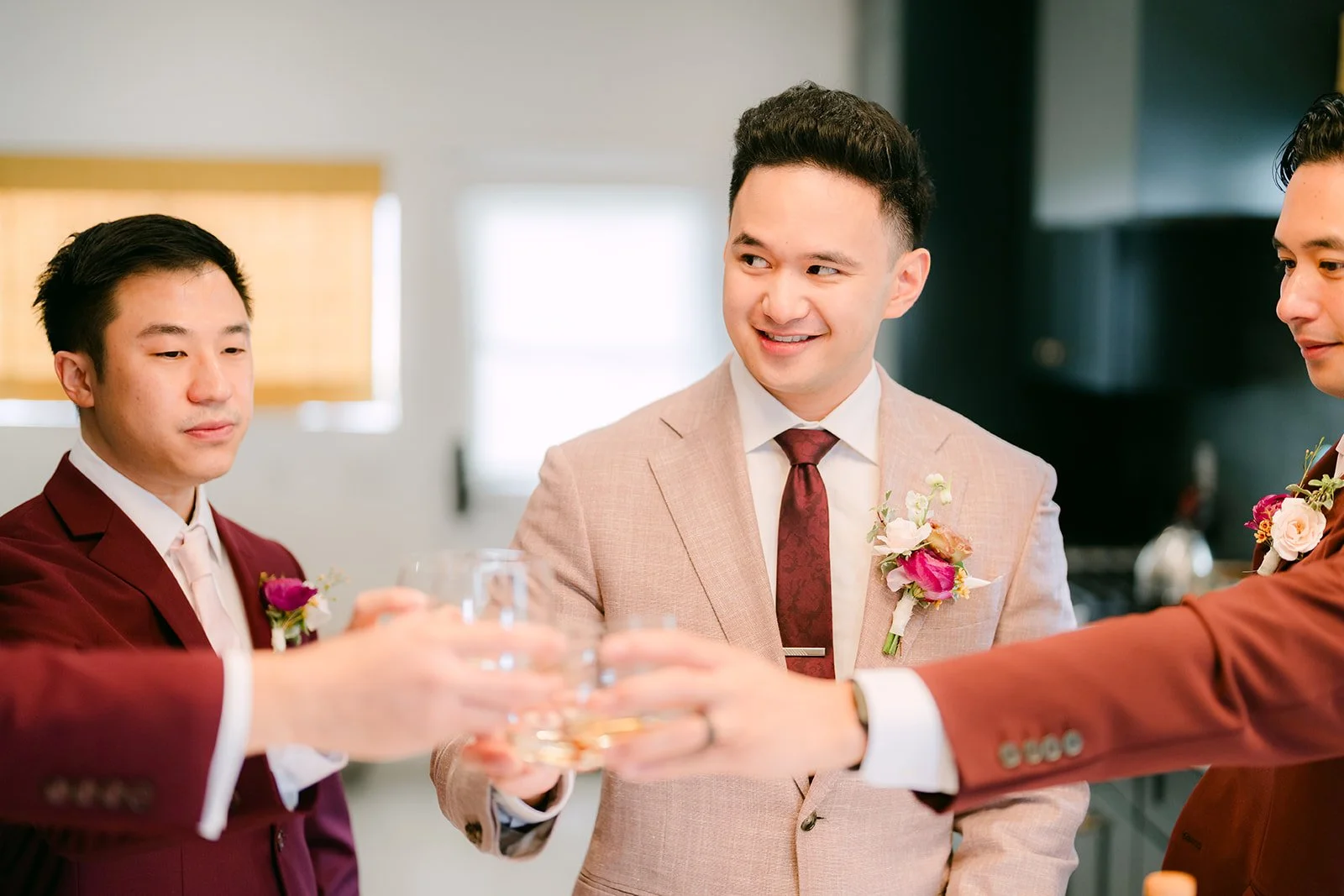 Michael and his groomsmen raising a champagne toast before the ceremony.