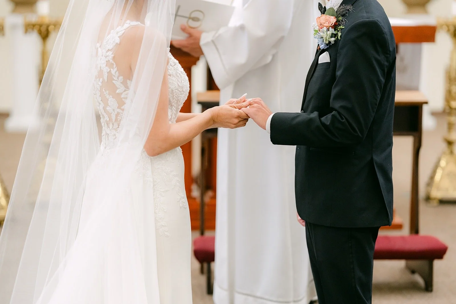 Francesca slips the ring onto Daniel's finger