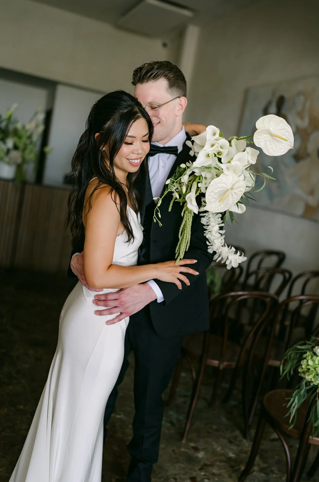 Justine wrapping her arm around Matthew