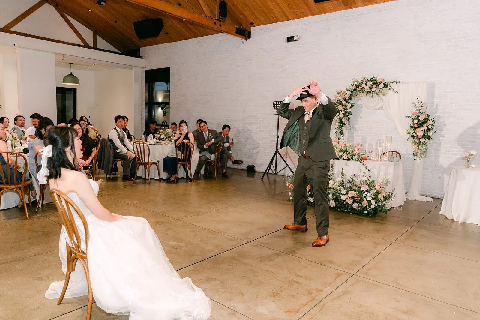 Alex dancing toward Vivian during his surprise dance