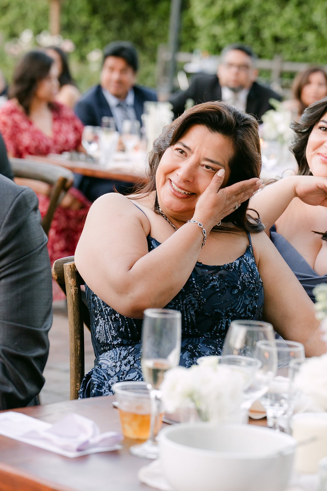 Guest reacting with emotion during a toast