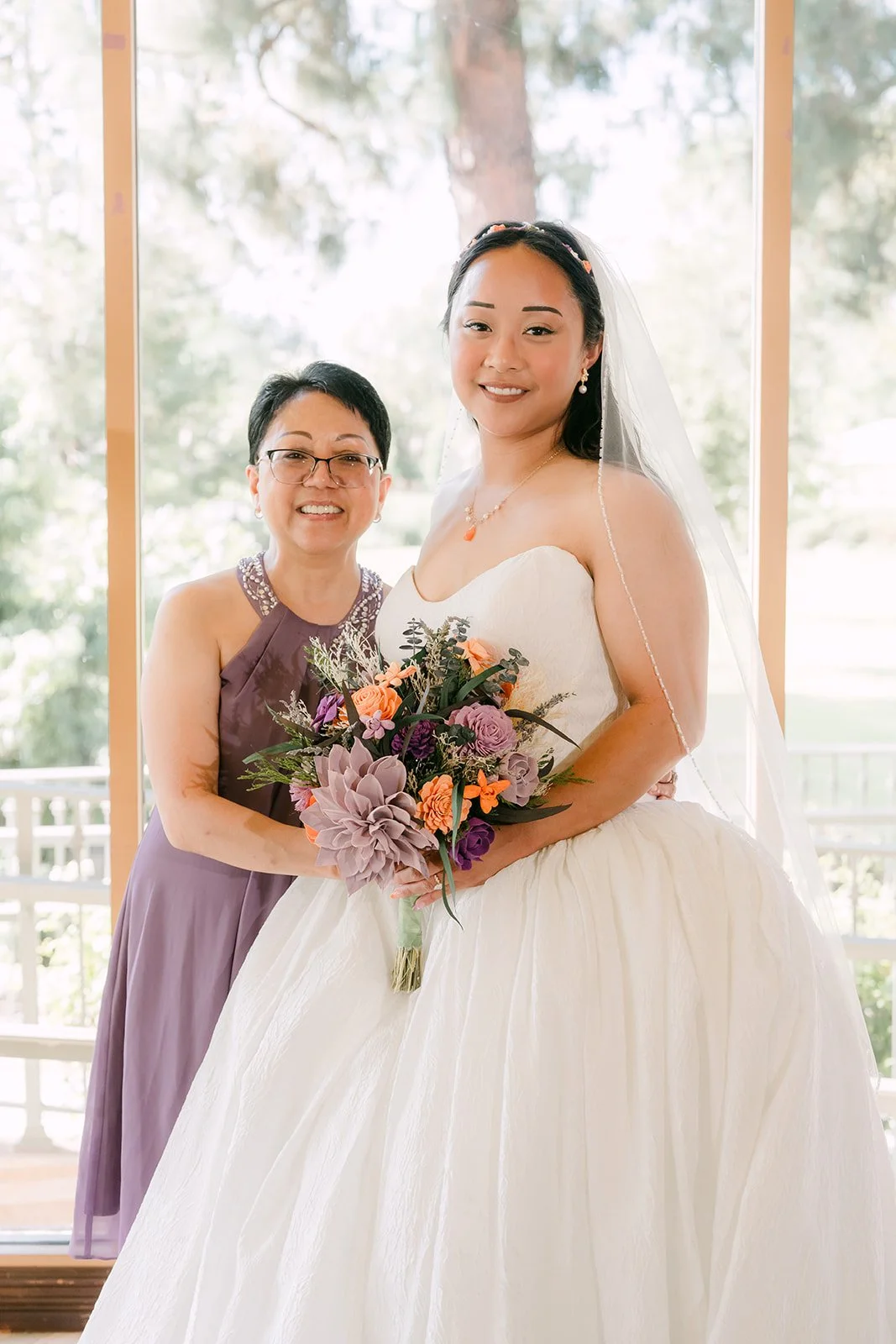 Angela with a family member in lavender