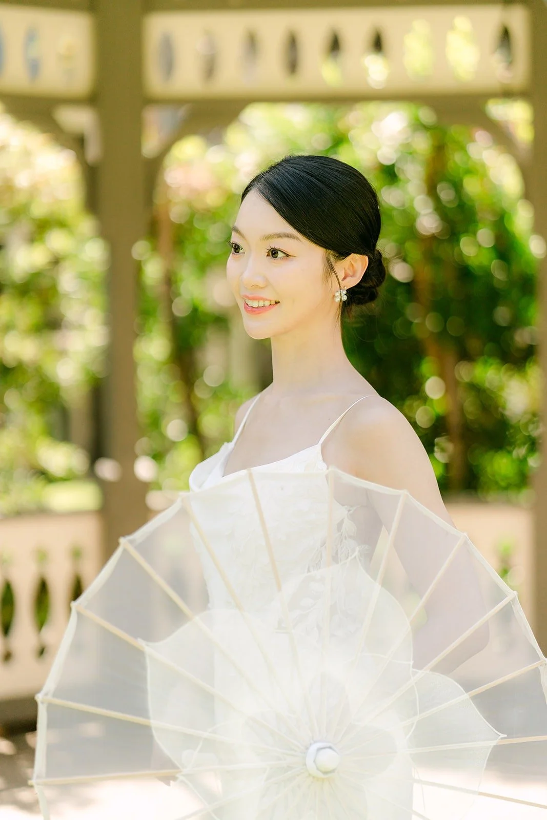 Tin with a sheer white fan beside the gazebo