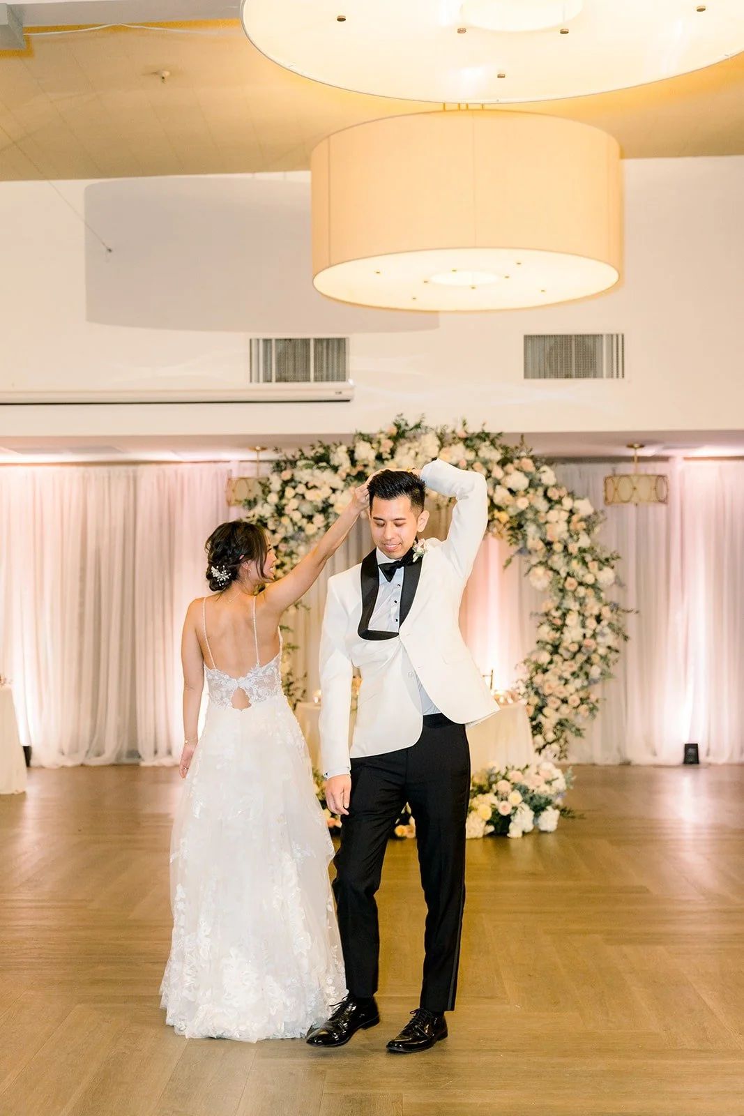 David spinning Josephine on the dance floor