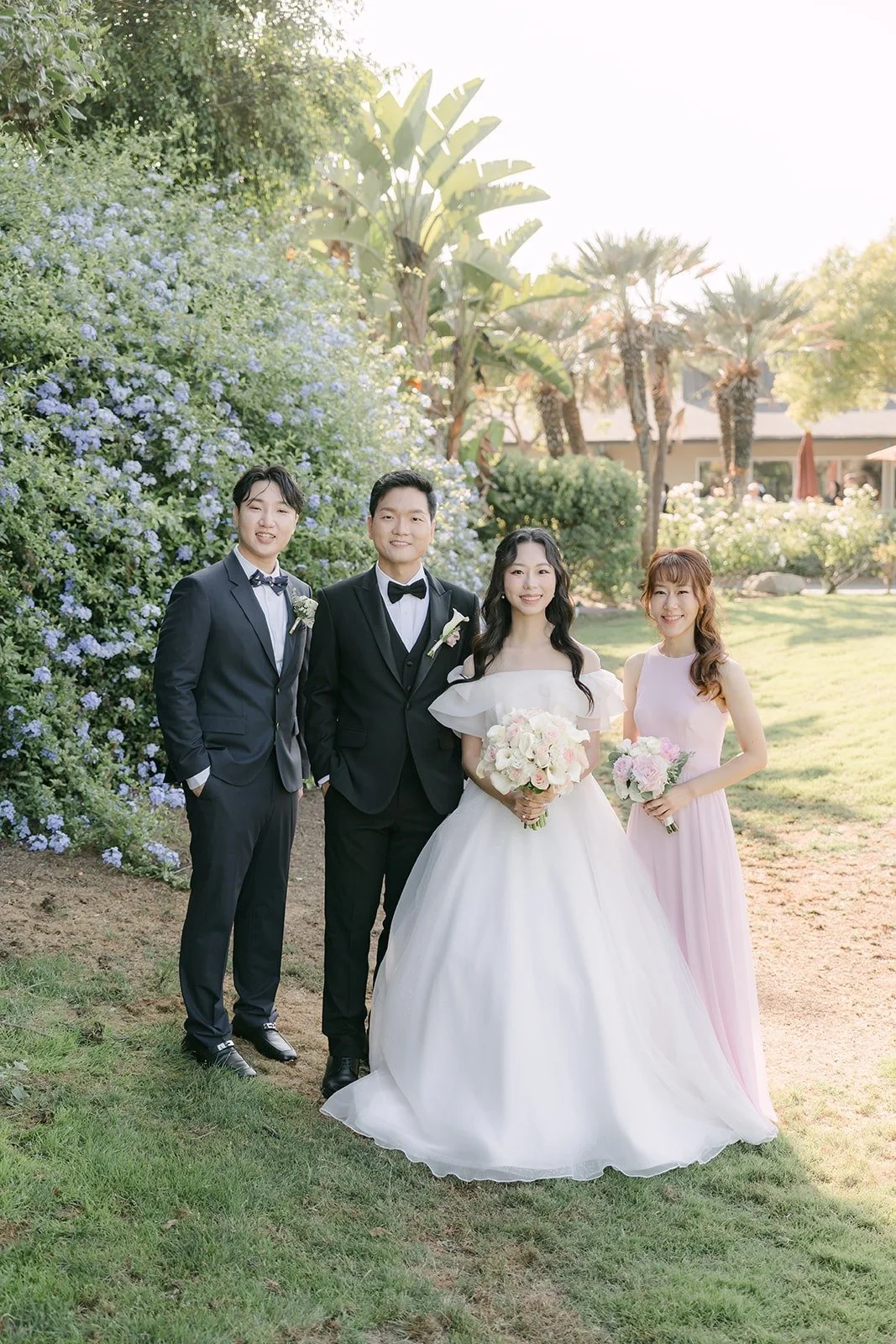 Jeannie and Eunsang with maid of honor Stephanie and best man Andrew