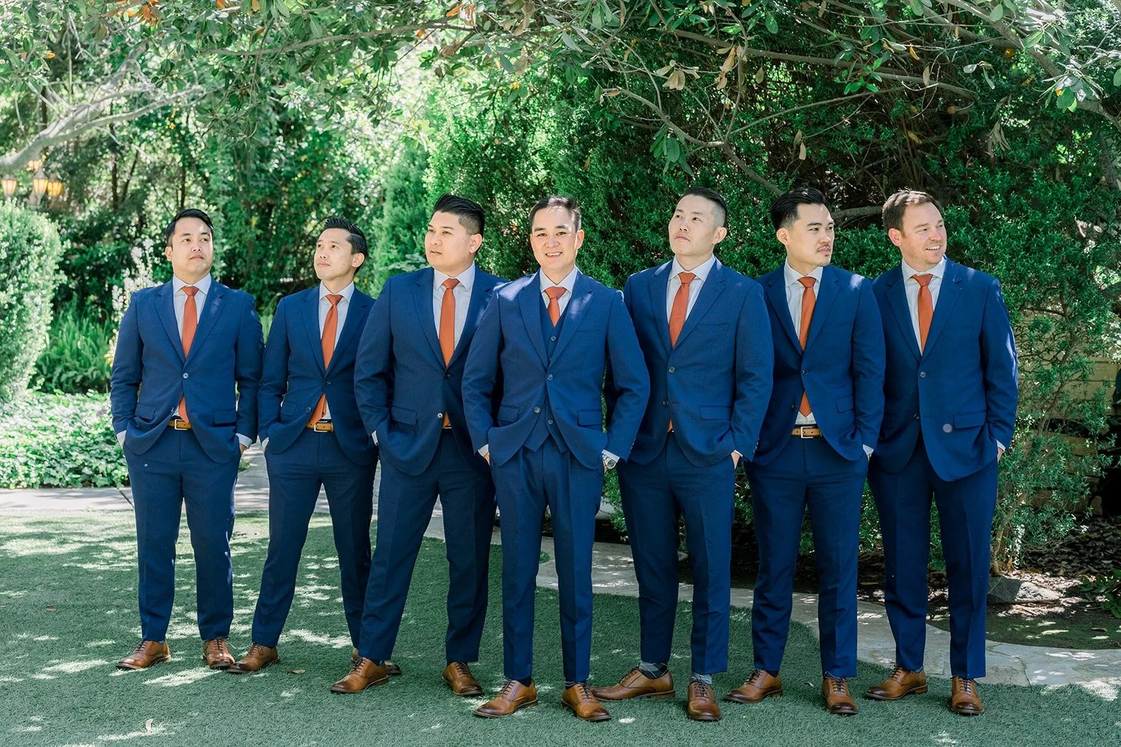 Vincent with his groomsmen in navy suits