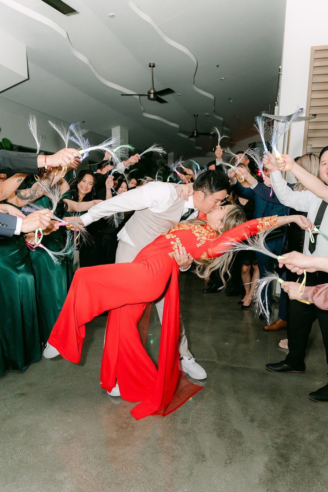 Raine dancing through a tunnel of ribbon wands