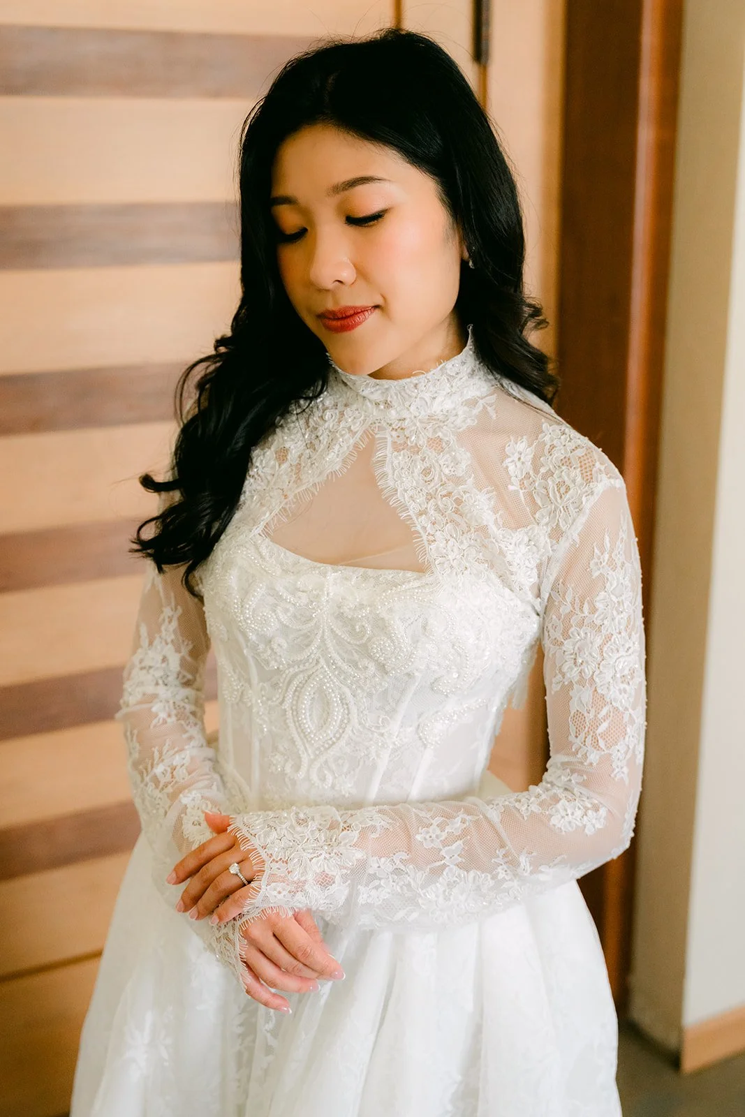 Bridal portrait of Kim in her high-neck lace gown