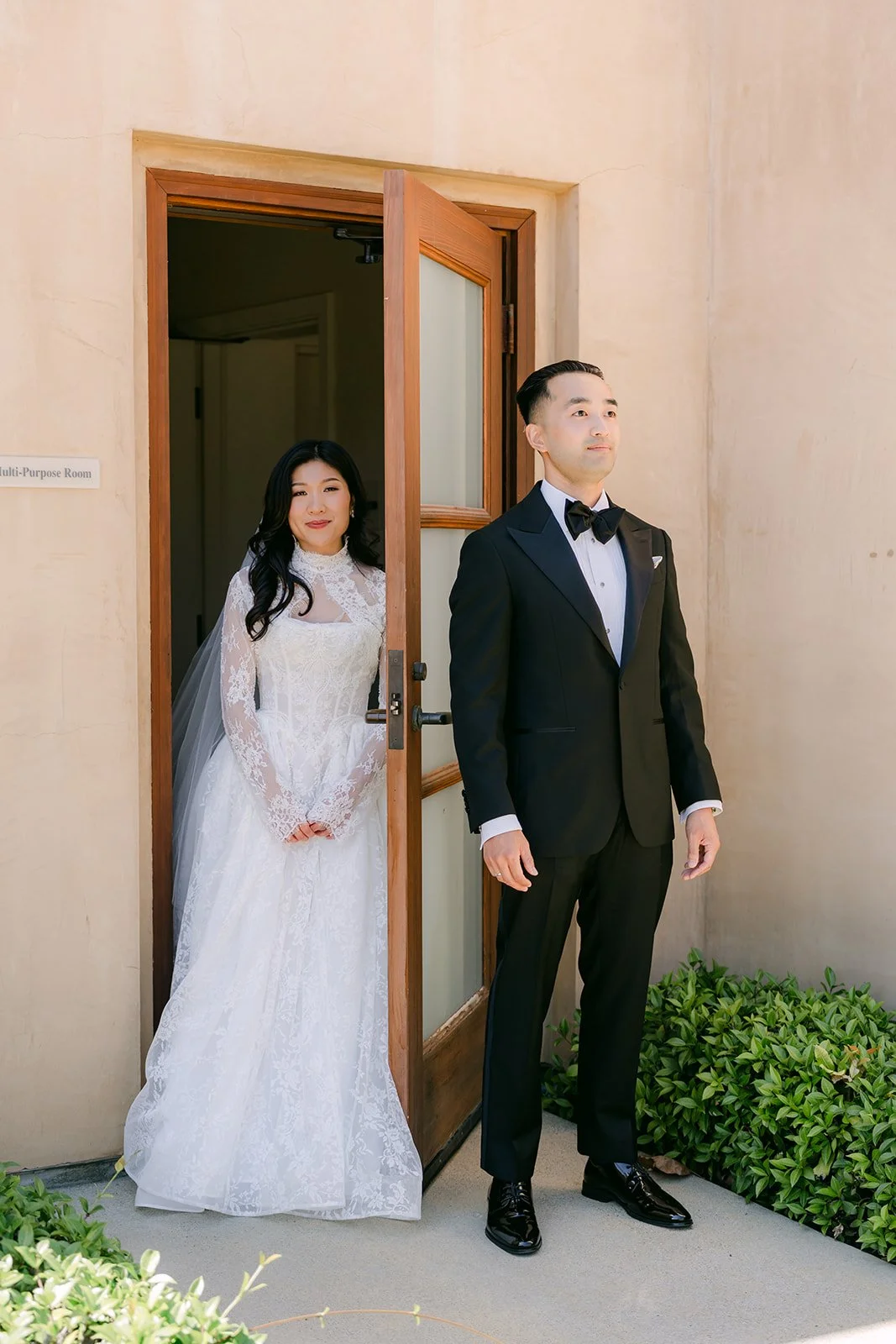 Kim and Vincent at the bridal suite door after their first touch
