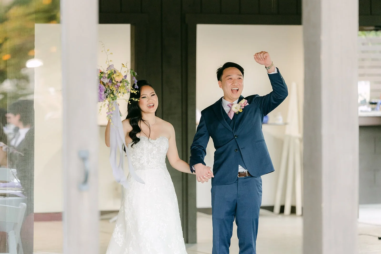 Elijah throwing a fist in the air during the grand entrance.