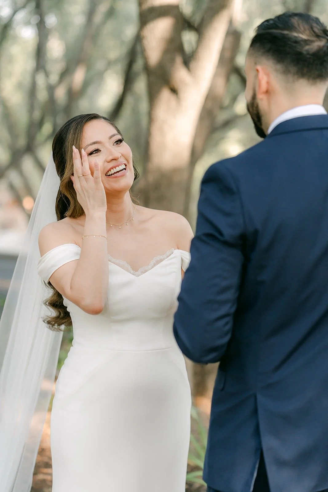 Mariana wiping a happy tear as Danny looks on