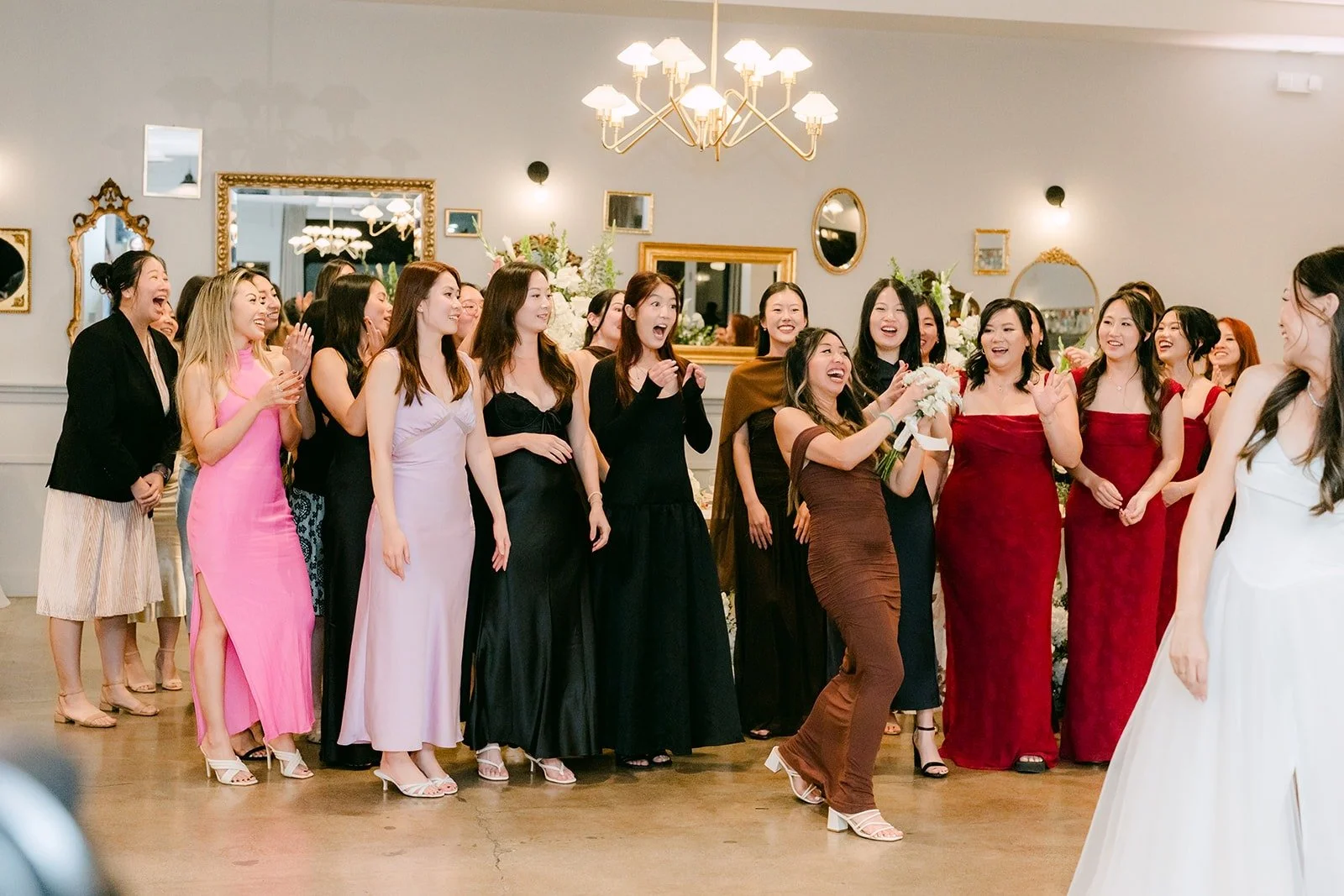 Guests lining up for the bouquet toss
