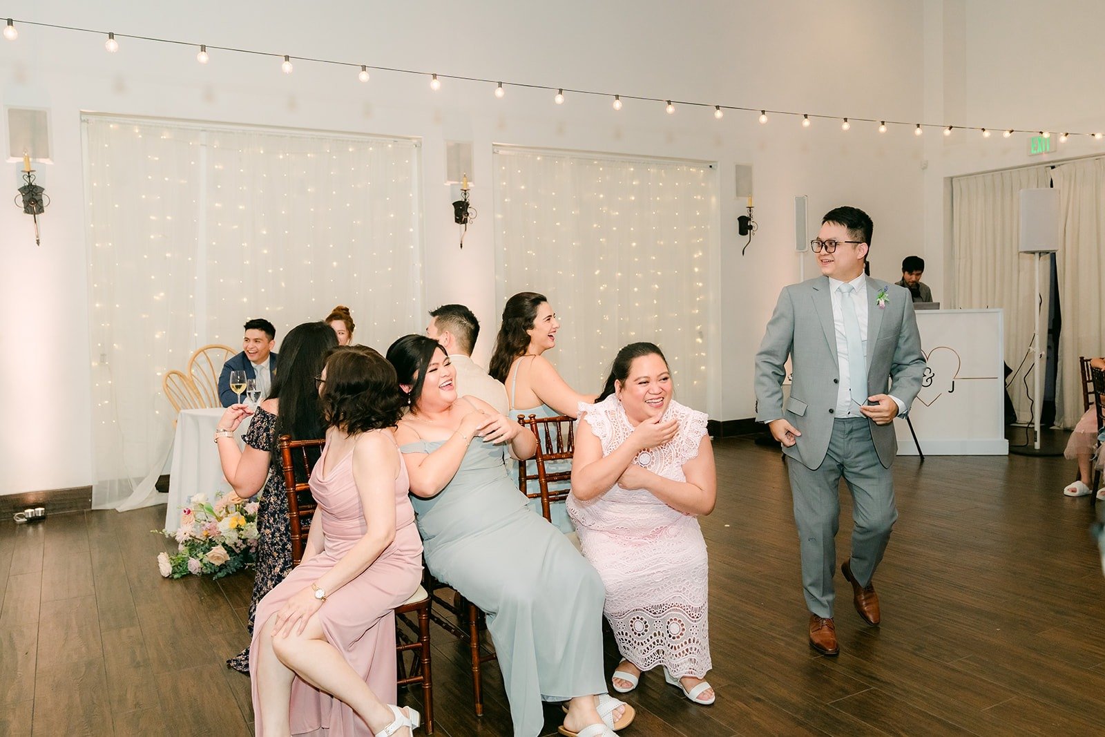 Guests gathered on the dance floor for a game