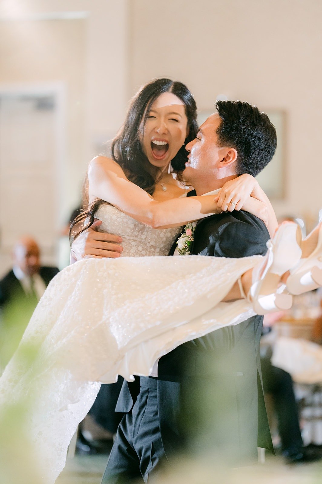 William lifting Kristine in the spin that closed their first dance