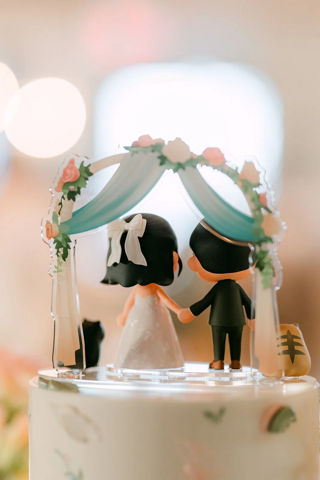 Custom cake topper of the couple