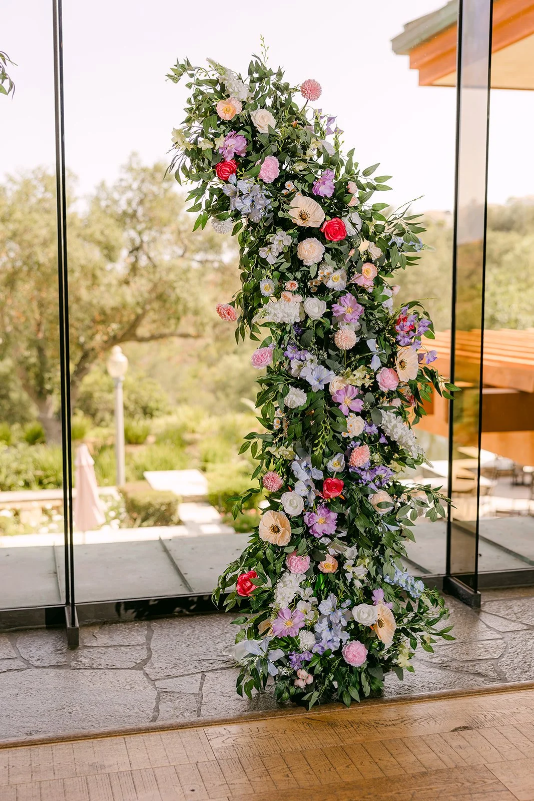 A floral column of lavender and pink blooms