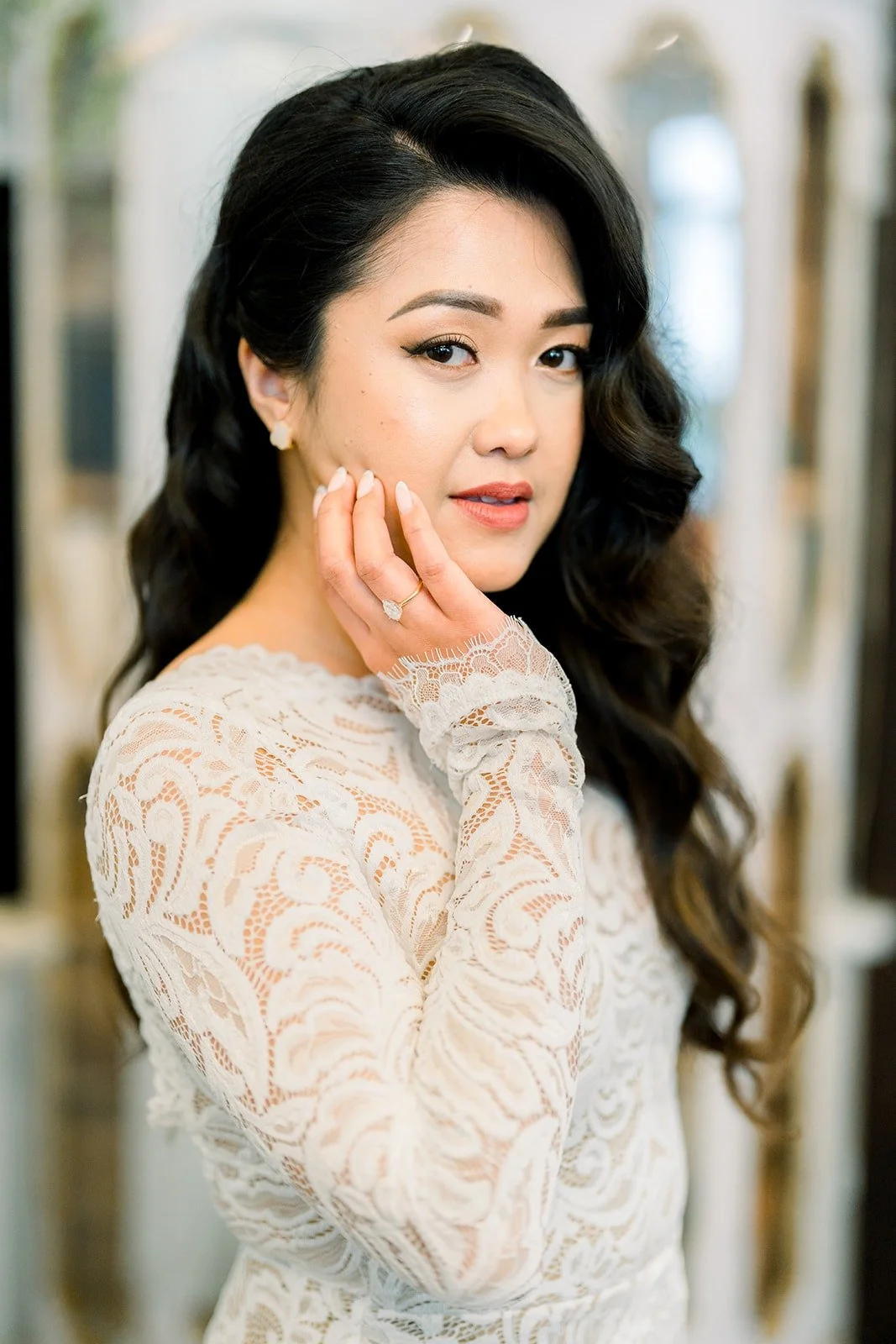 Portrait of Hannah in her long sleeved lace gown