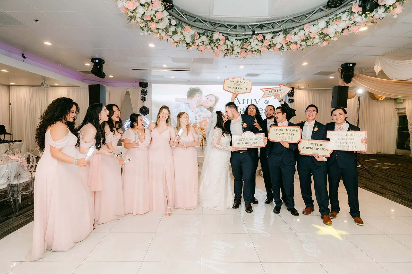 The full wedding party lined up on the dance floor after the entrance