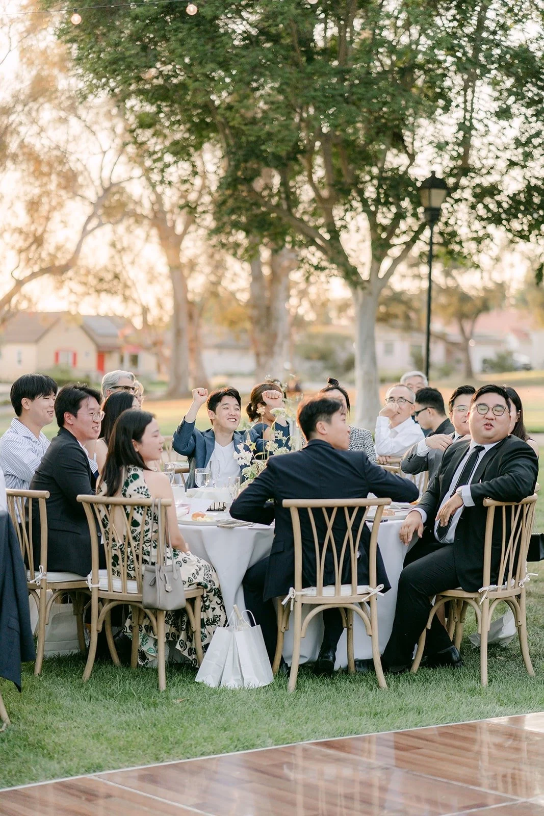 Guests watching the first dance from their tables