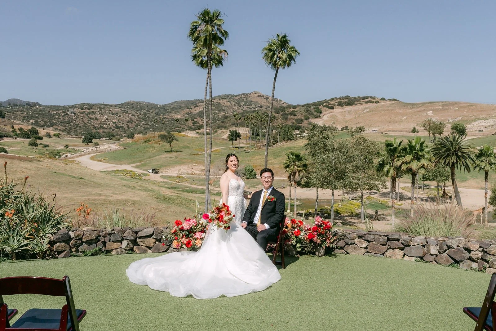 Joanne and Zach at their ceremony site at Kijamii Overlook in the San Diego Zoo Safari Park