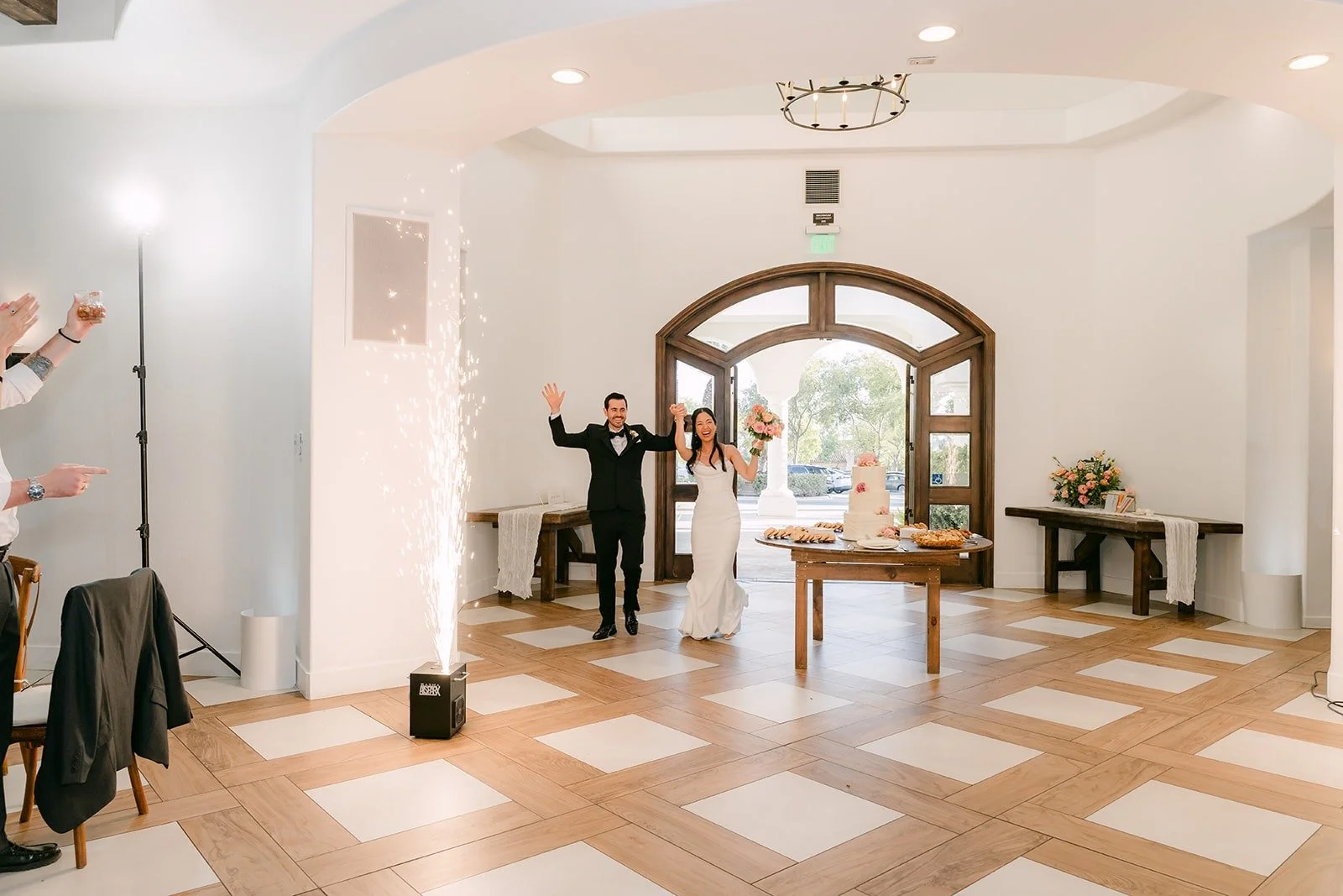 Stephanie and Kevin making their grand entrance into the reception room