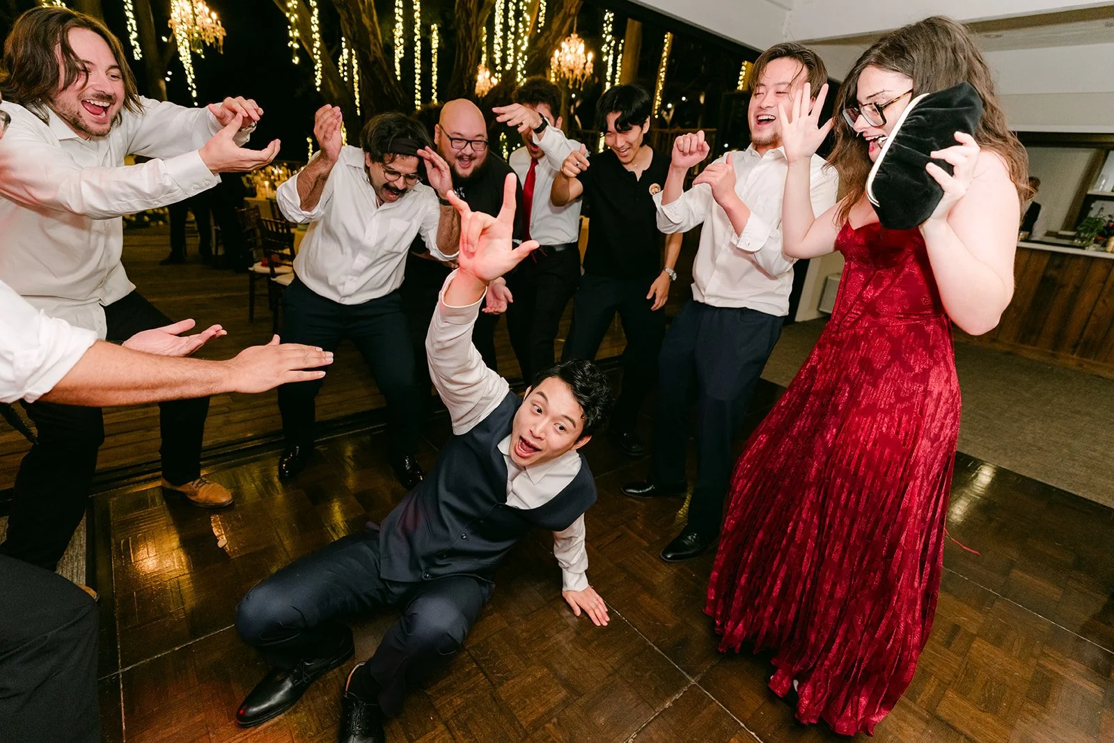 Guests mid jump during a high energy dance break
