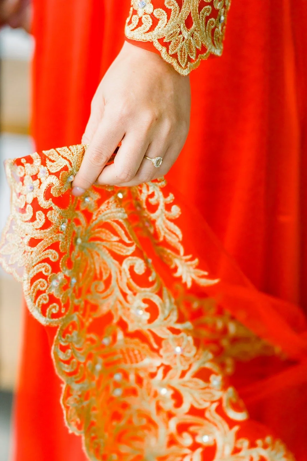 Detail of the gold embroidery on Cindy's red tea ceremony dress