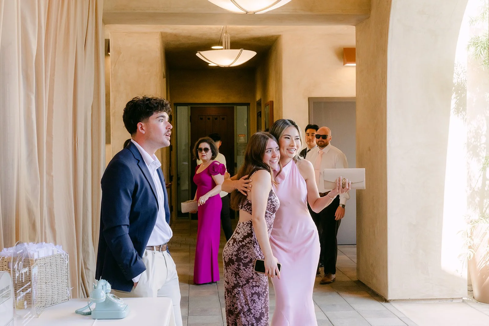Guests mingling inside the Serra Plaza Lounge during cocktail hour