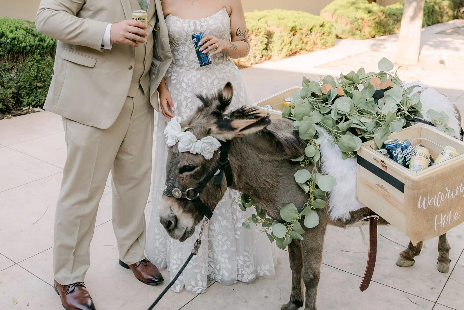 Guests getting drinks from the beer donkey.
