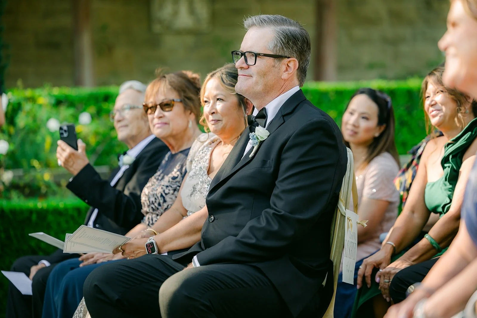 Guests watching the ceremony from their seats