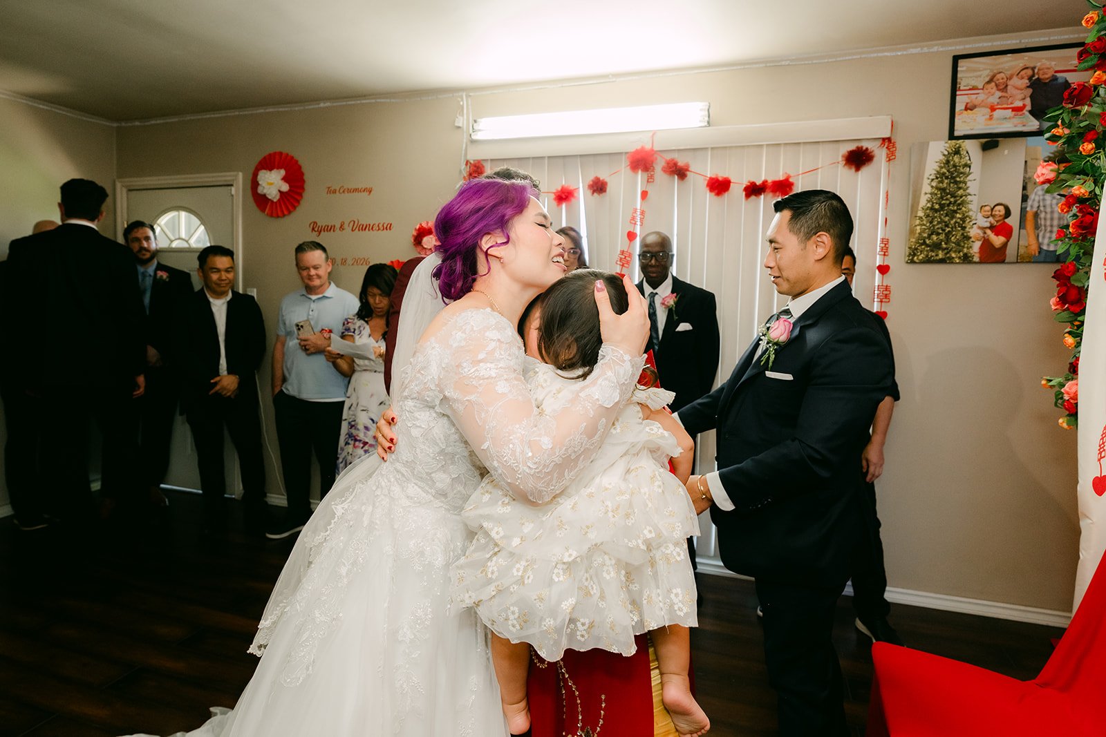 Vanessa hugging her niece during the tea ceremony.