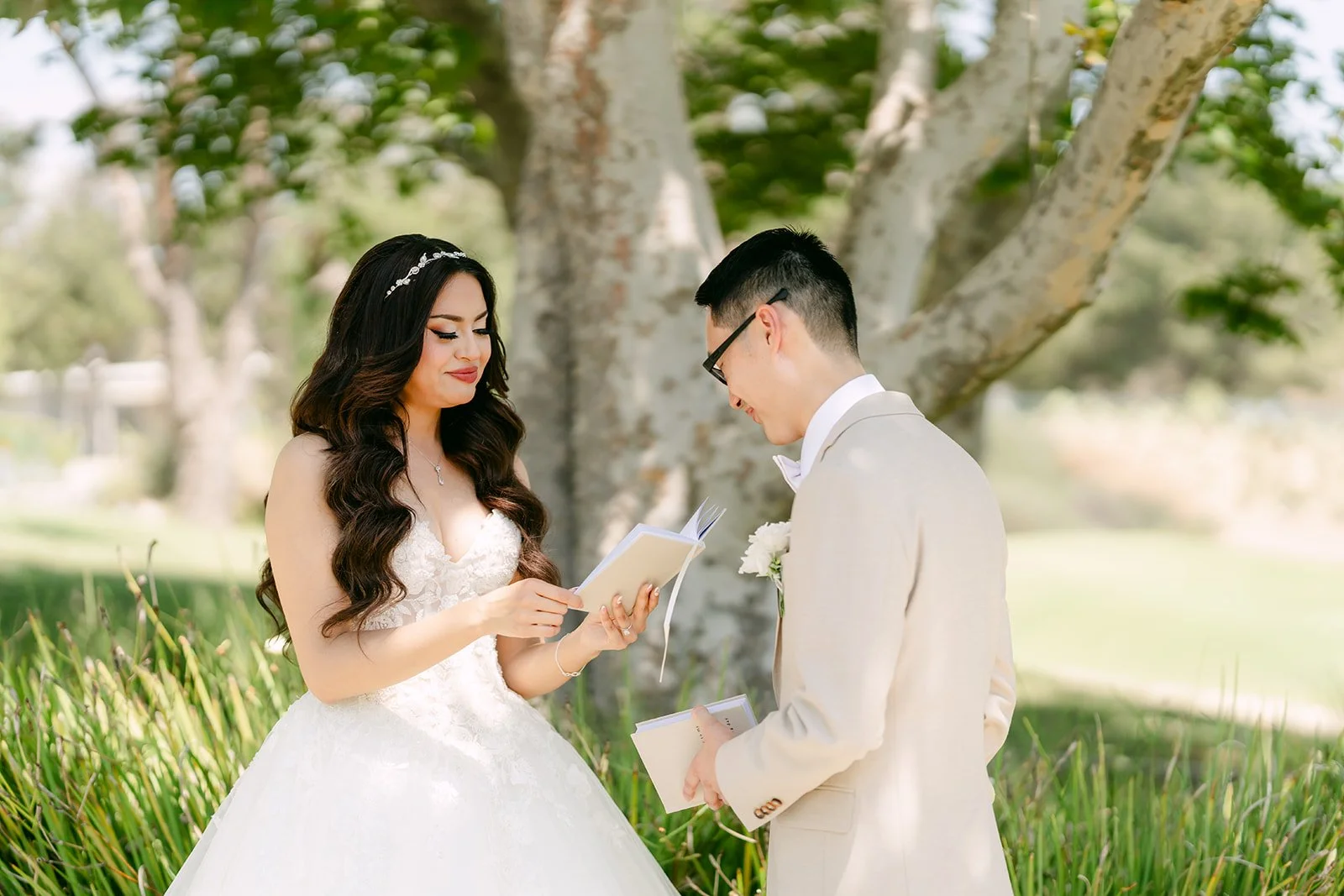 Sandra listening as Kevin reads his vows.