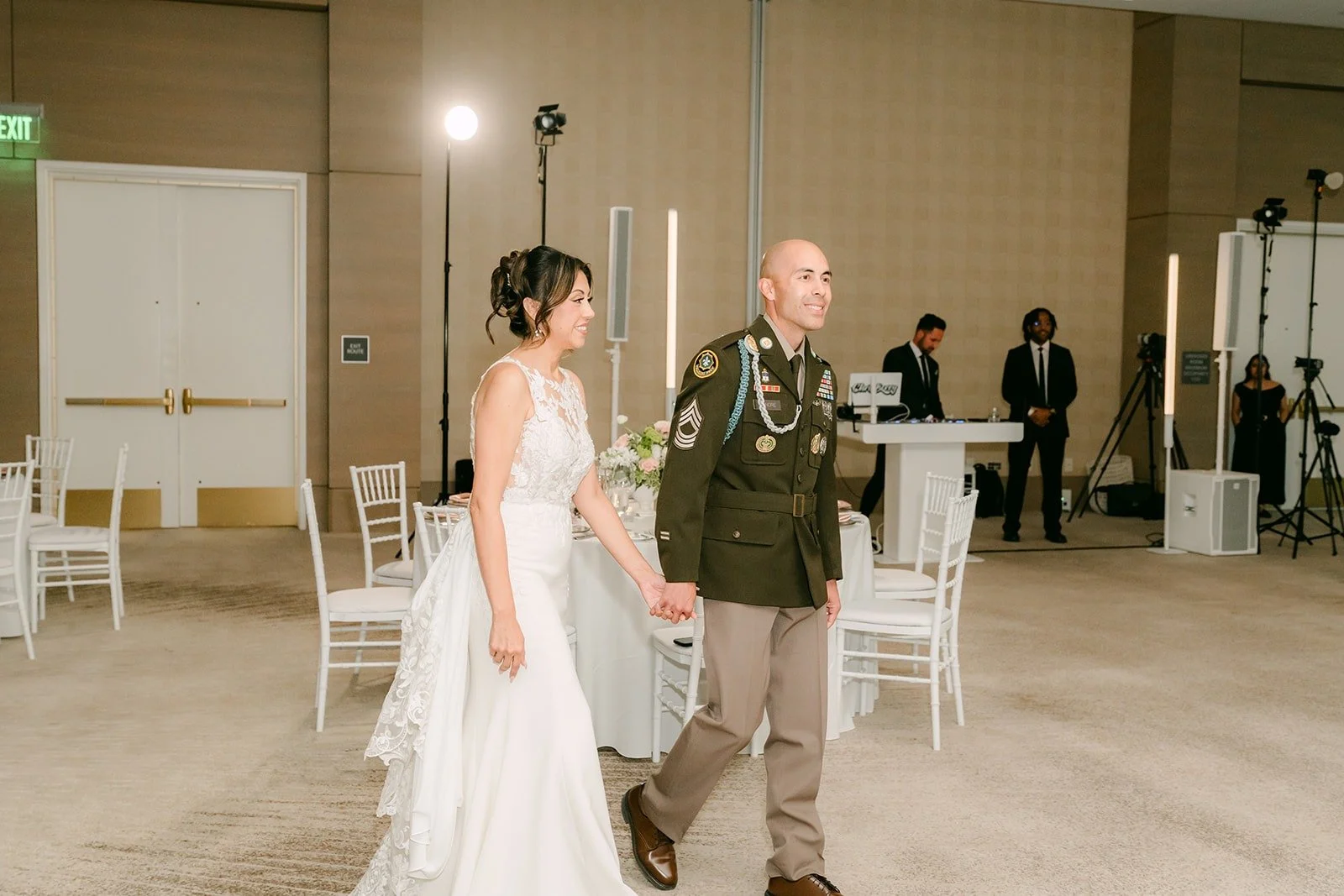 Francesca and Daniel walk into the Carousel Ballroom to see it for the first time