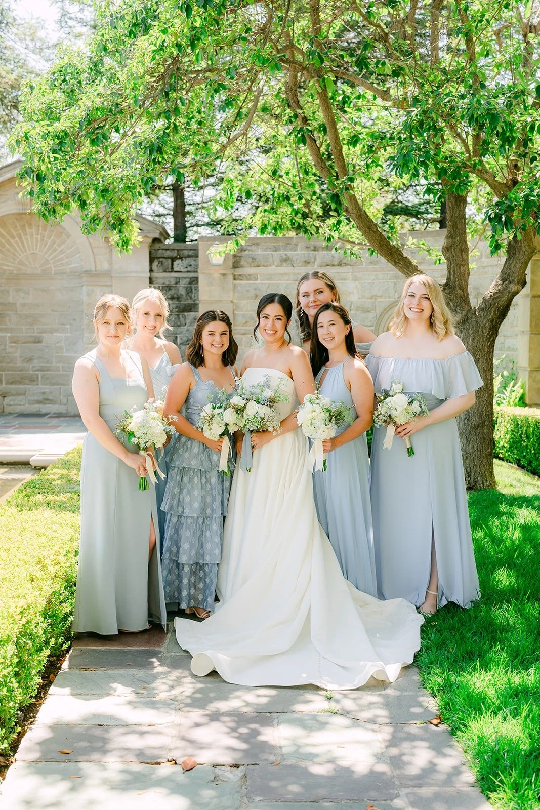 Brianna with her bridesmaids in the Greystone gardens