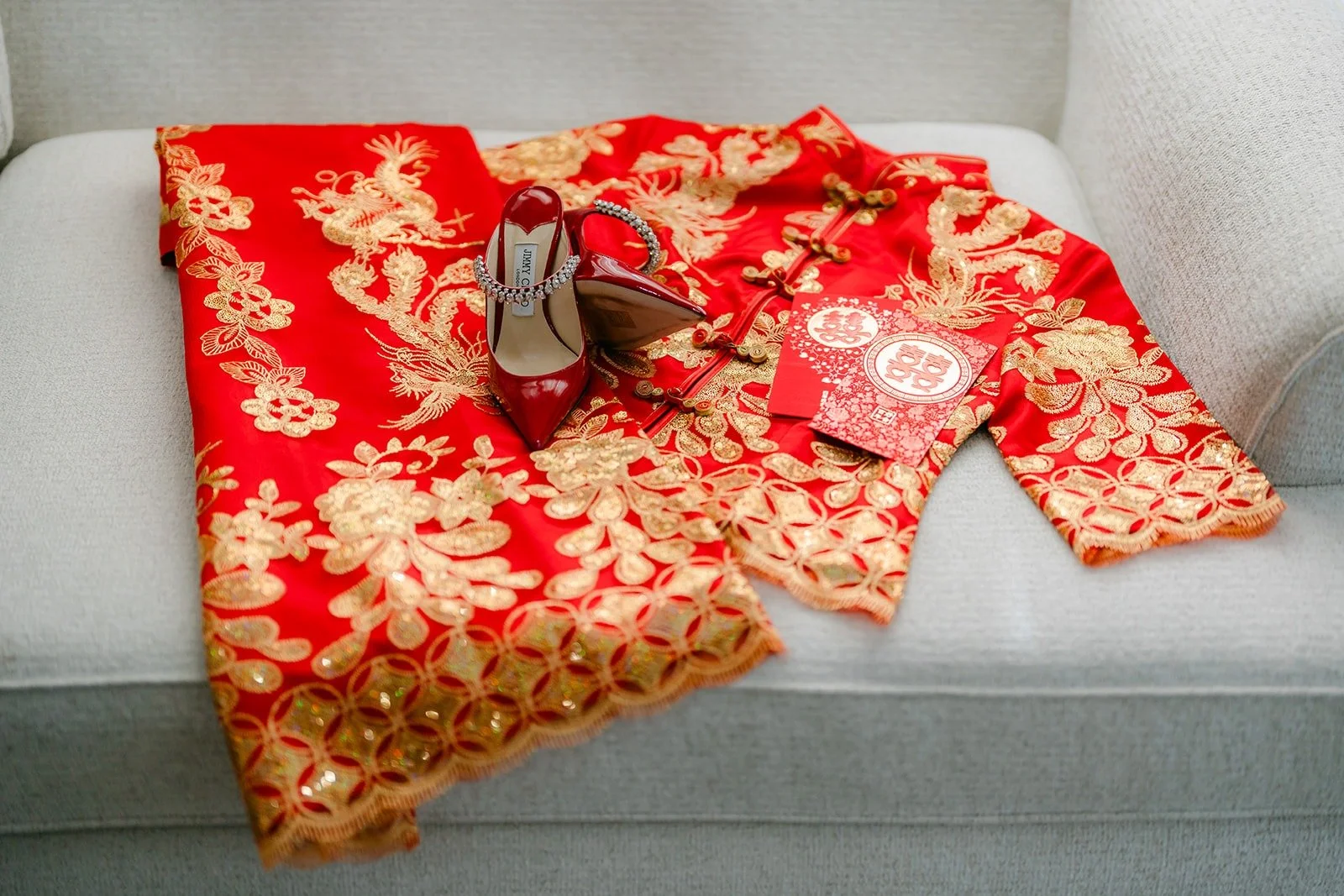 Candice's red and gold embroidered tea ceremony outfit