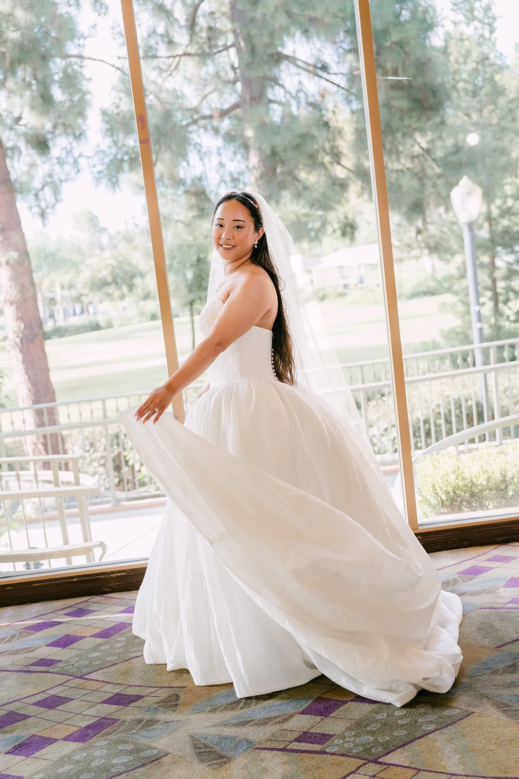 Angela spinning in her ball gown