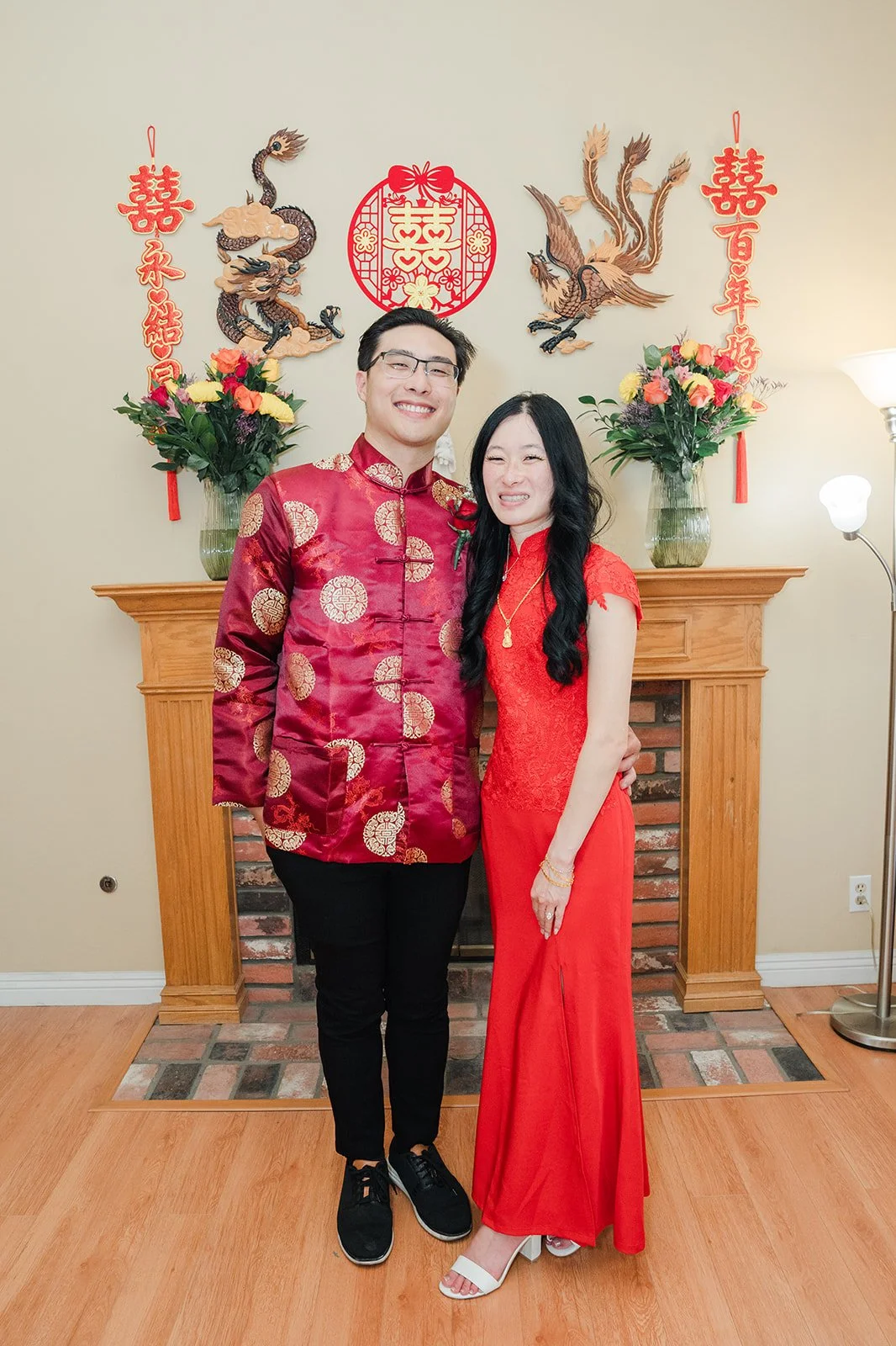 The couple by the mantel decor.