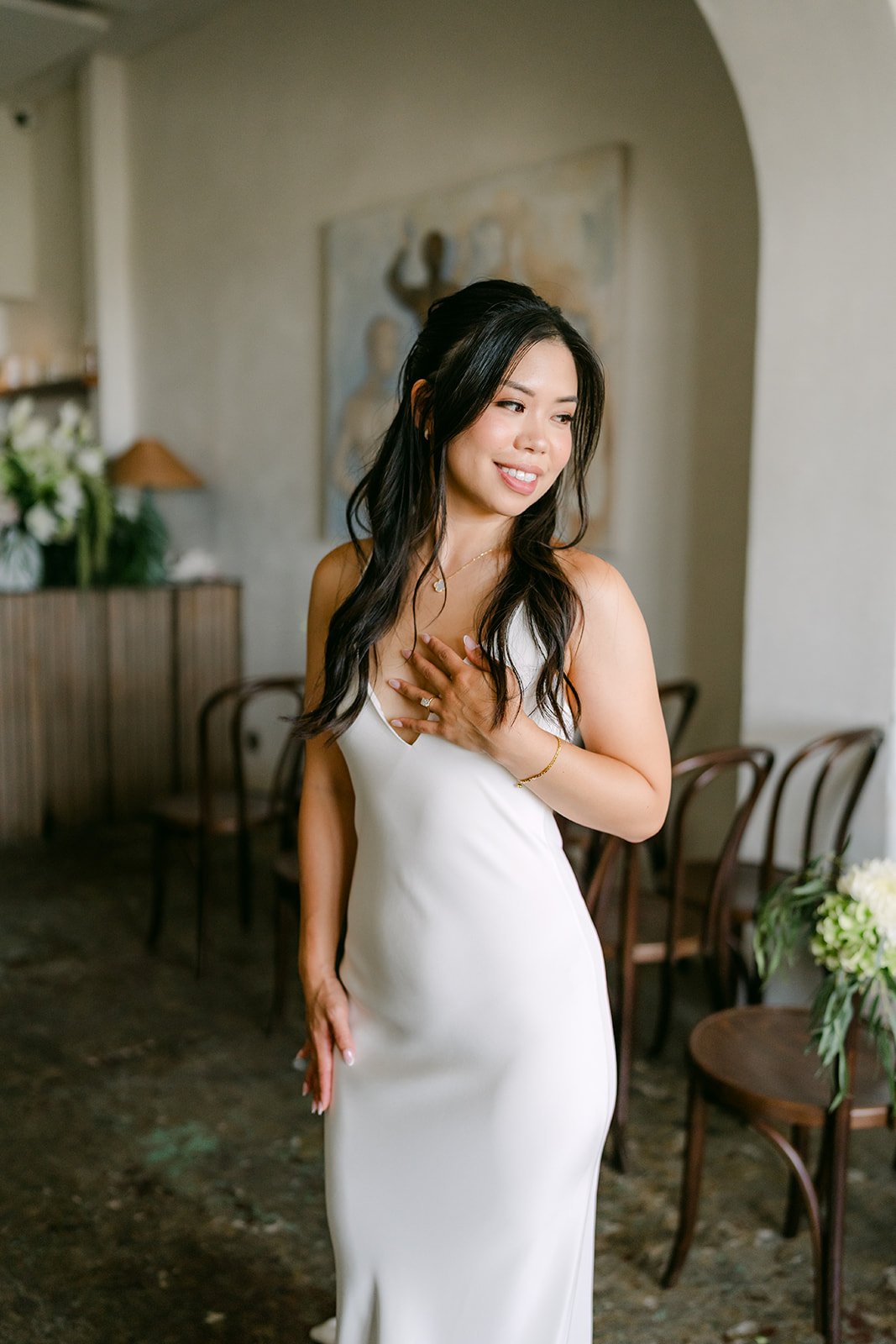 Justine laughing in her satin gown