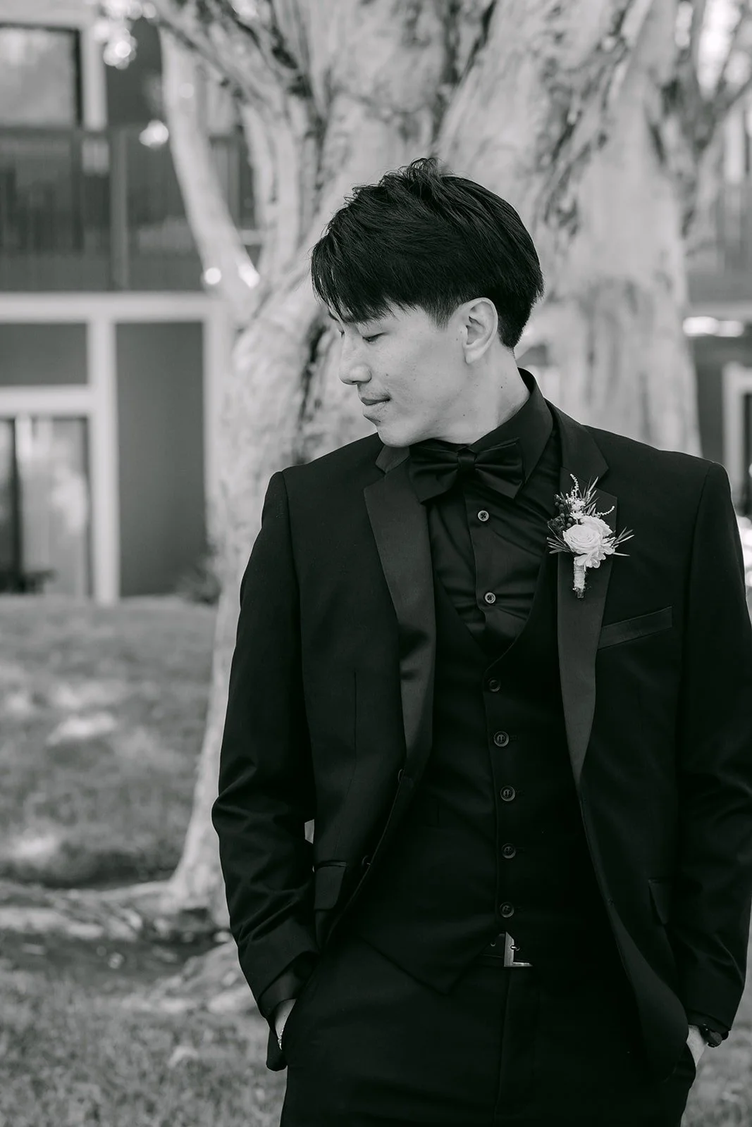 Black and white portrait of Fong under the trees