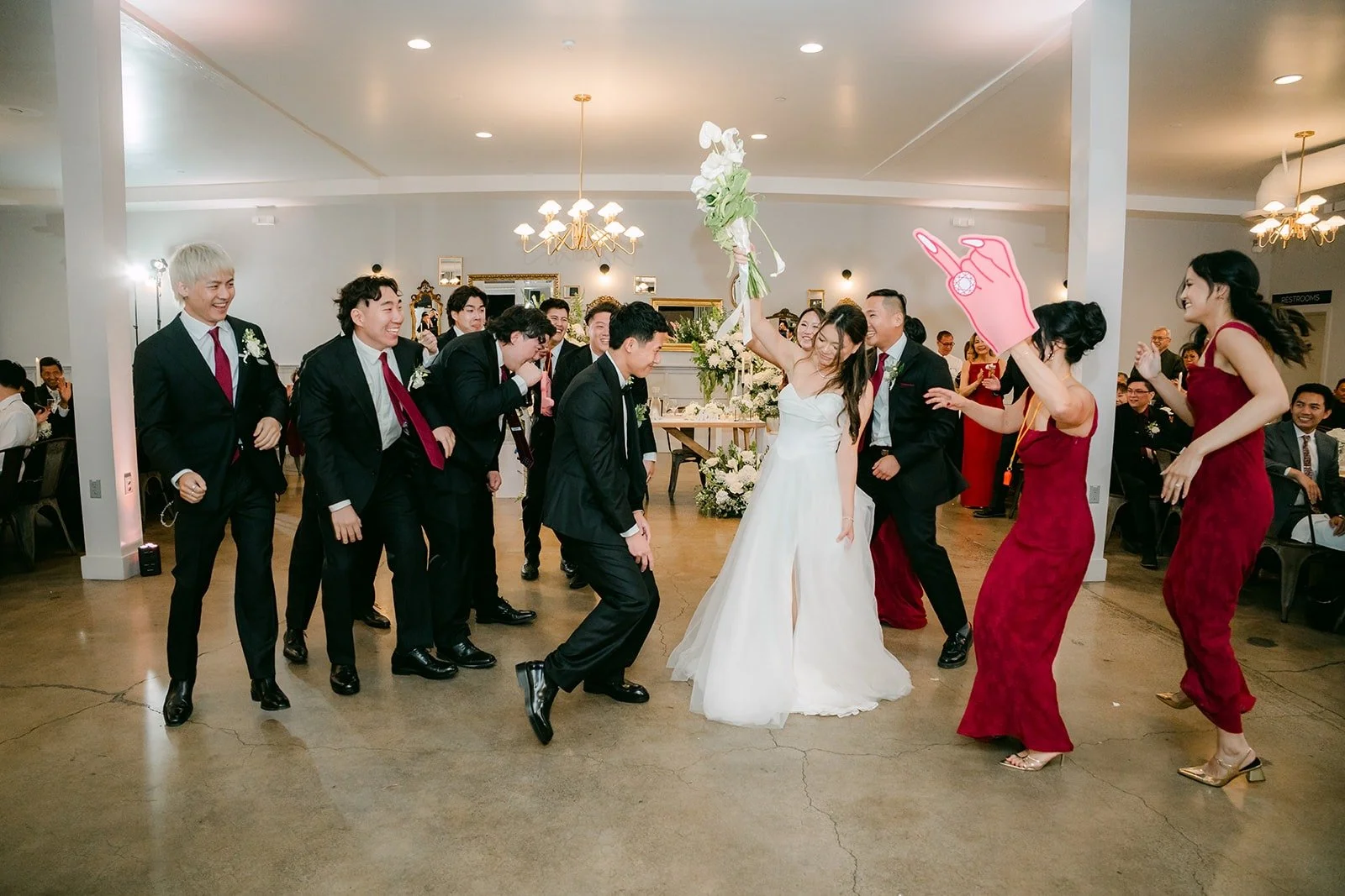The wedding party dancing as Jadee and Richard make their grand entrance