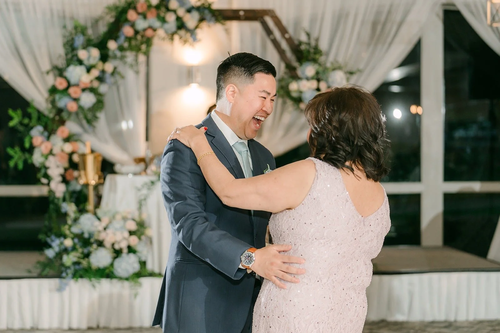 Jordan sharing a hug during his family dance, photographed by One and Only Production