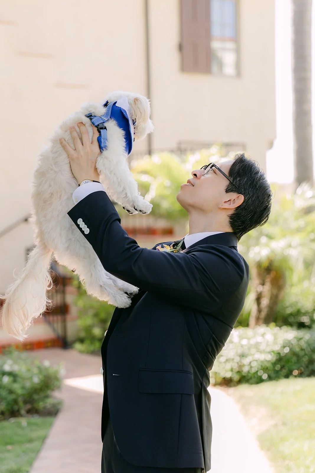 The pup held high above Leroy