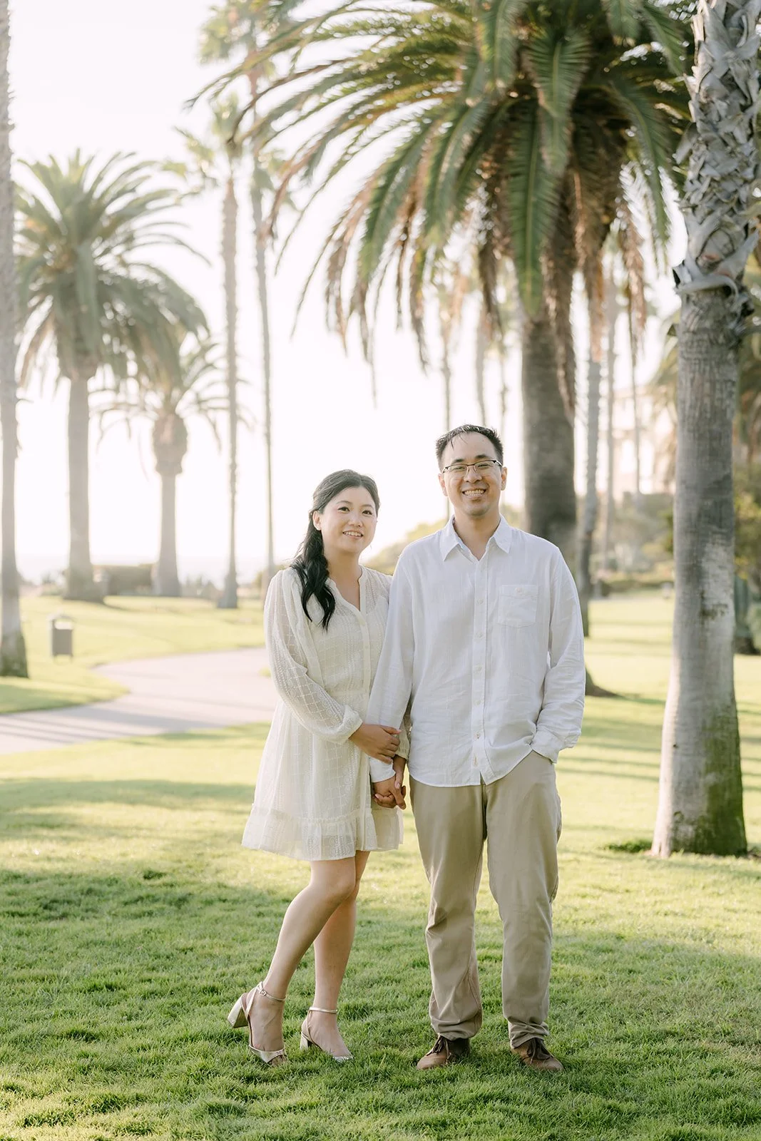 Constance and Lawrence on the lawn at Treasure Island Park, photographed by One and Only Production.