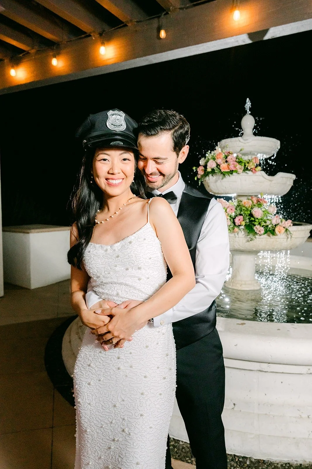 Stephanie and Kevin at the fountain at the end of the night, photographed by One and Only Production
