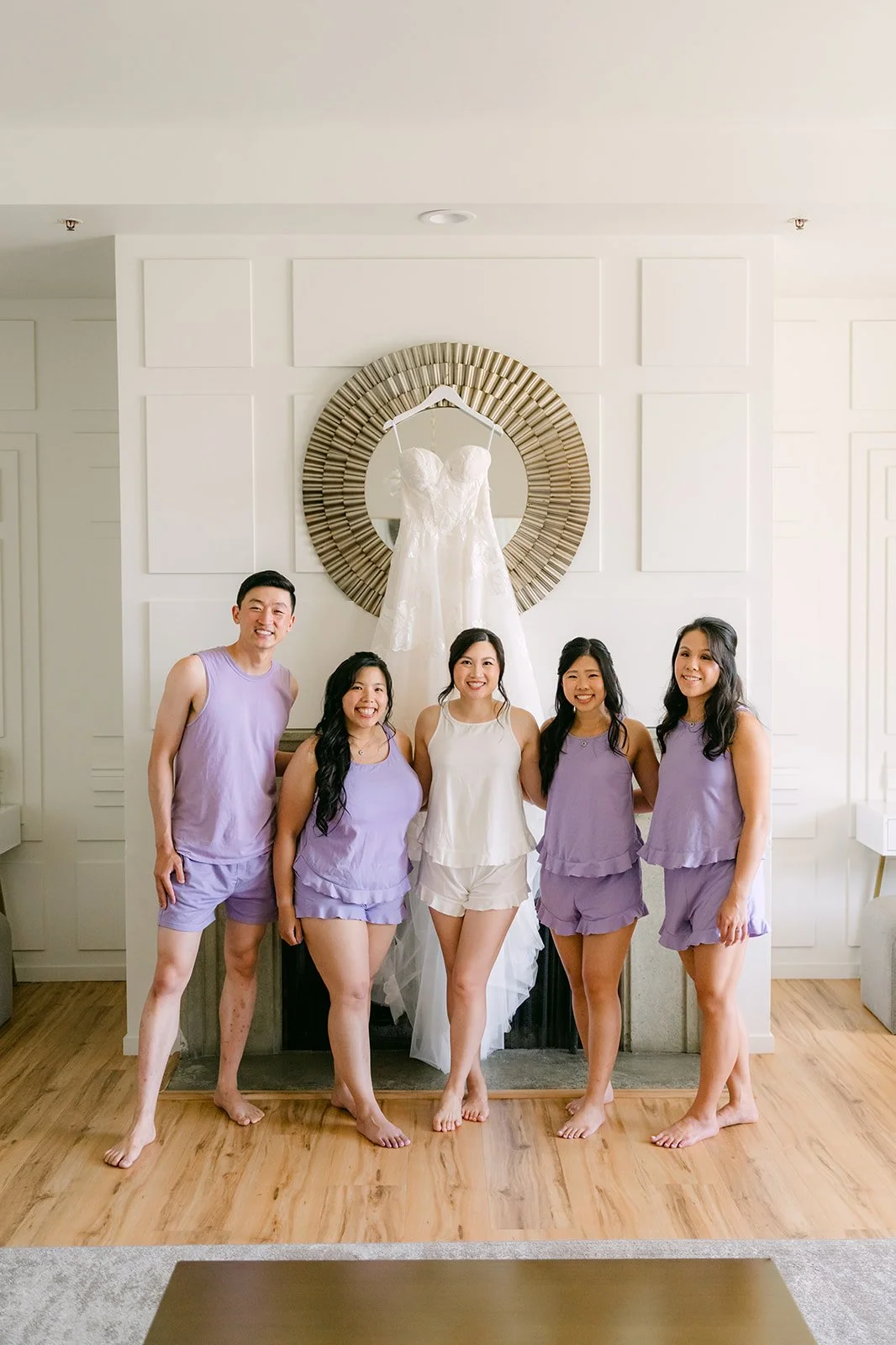 Bridesmaids in lavender pajamas with Mary