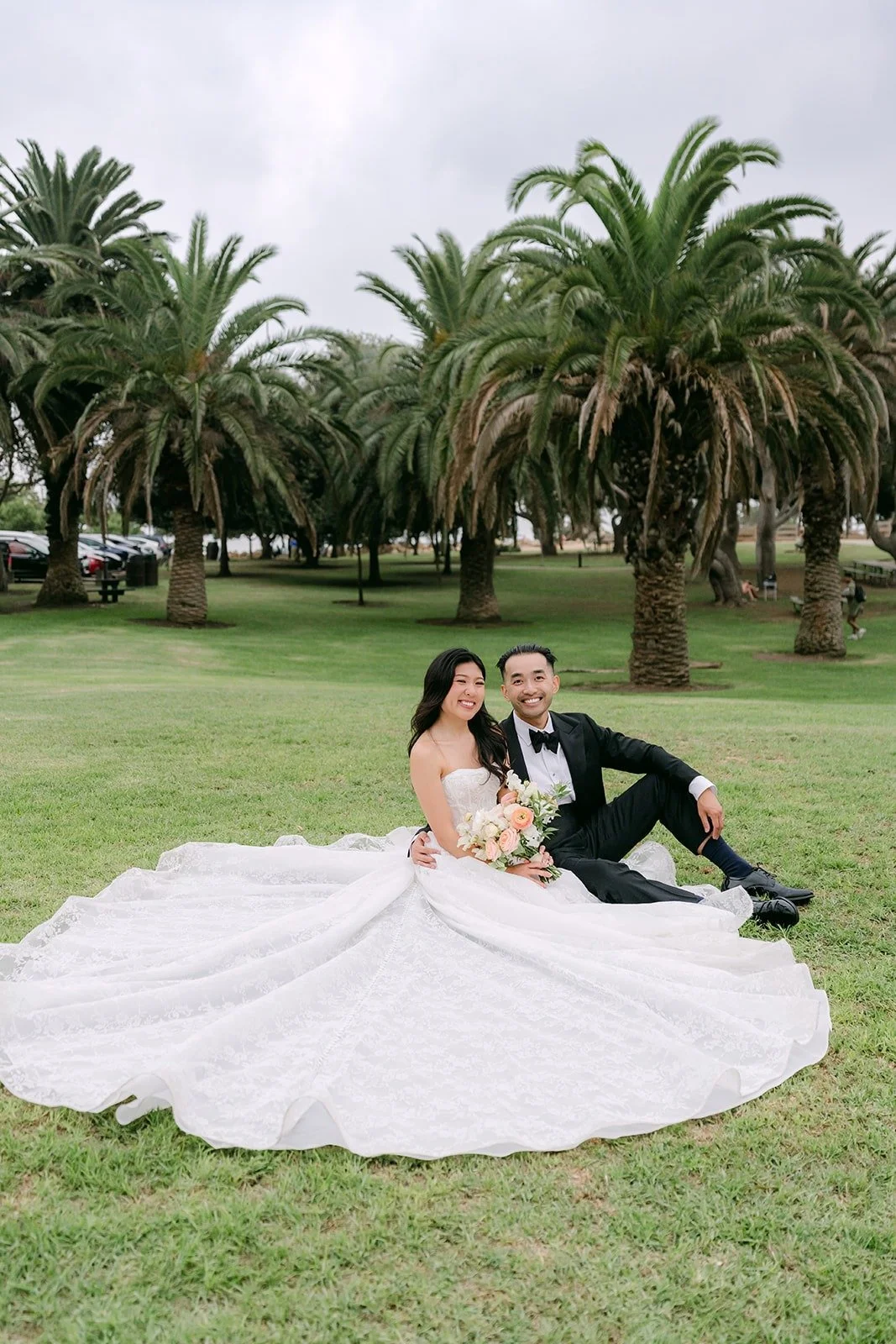 Vincent lying on the lawn beside Kim's train