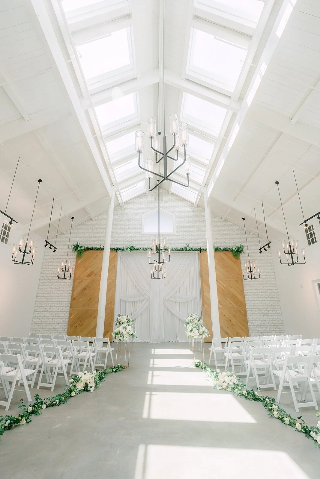 The white chapel with cathedral ceilings set for the ceremony