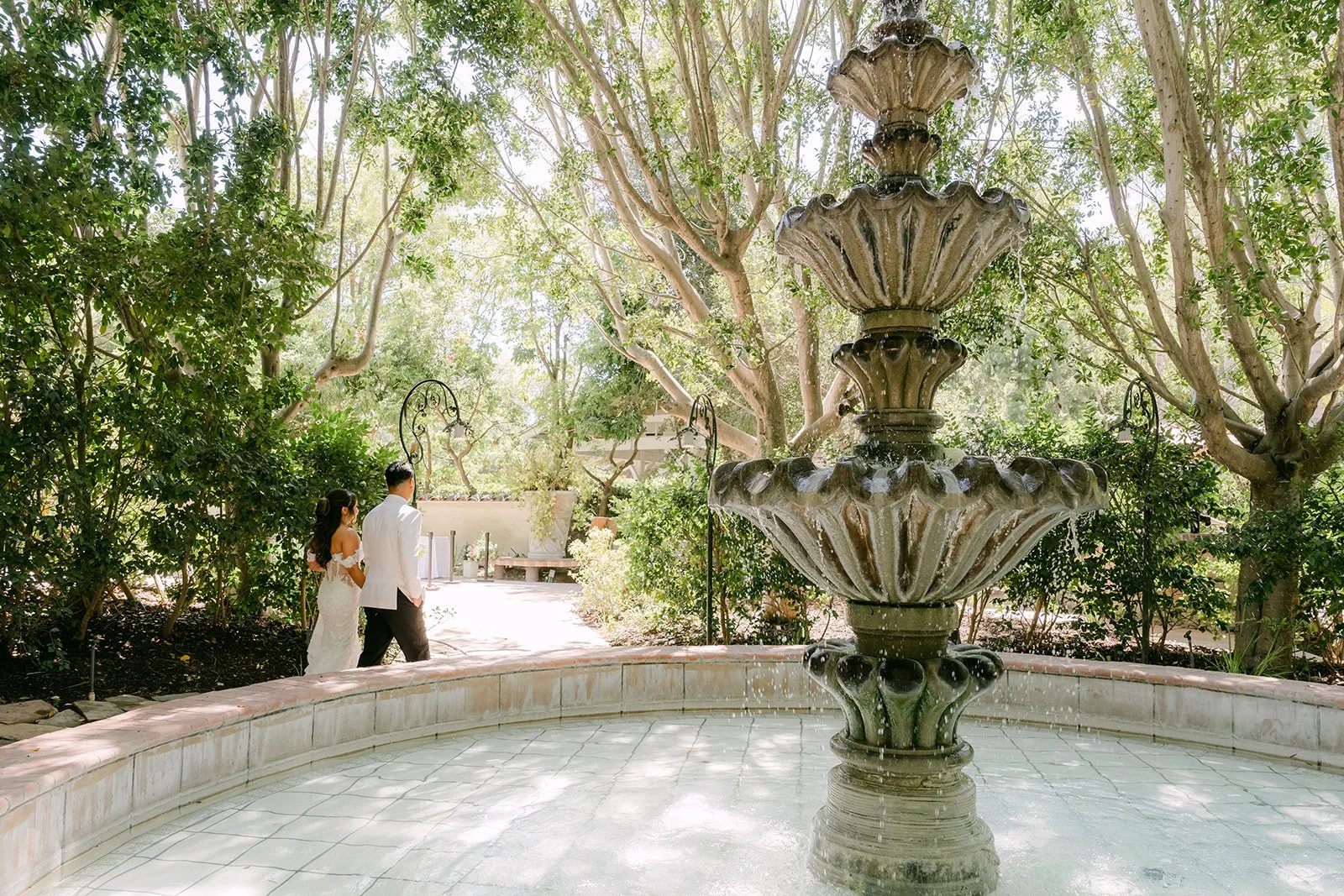 The tiered fountain at Eden Gardens with Nicole and Caryl in the distance.