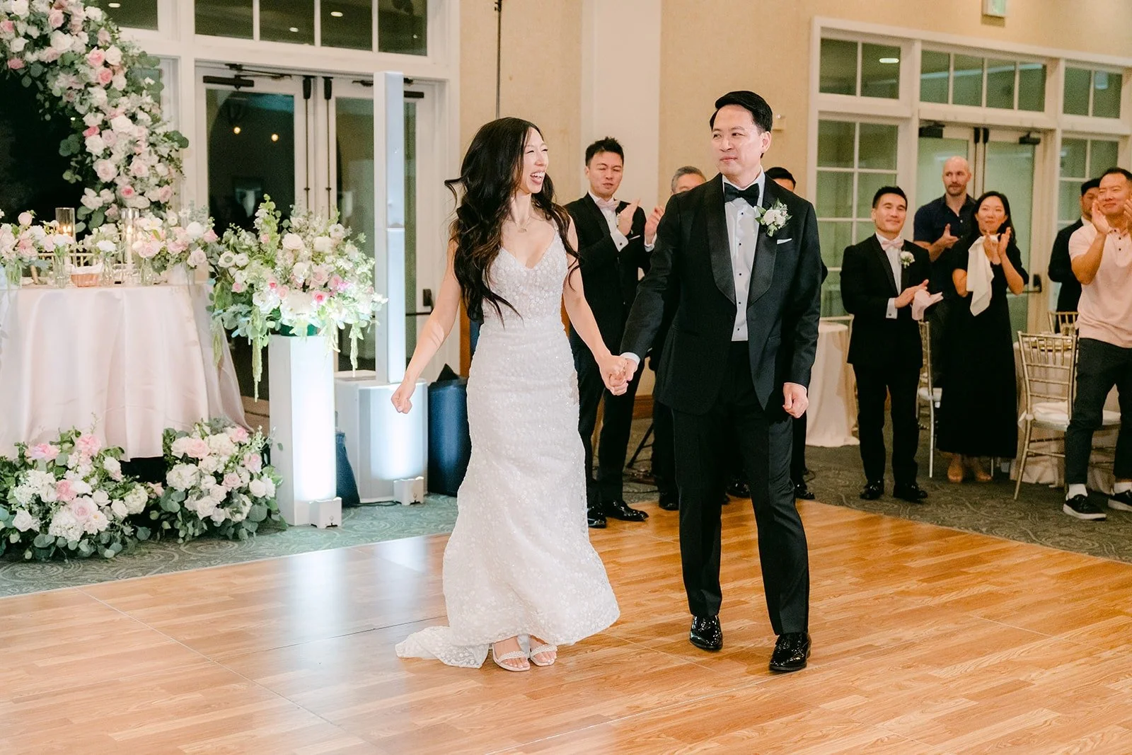 Kristine and William greeting their guests on the dance floor
