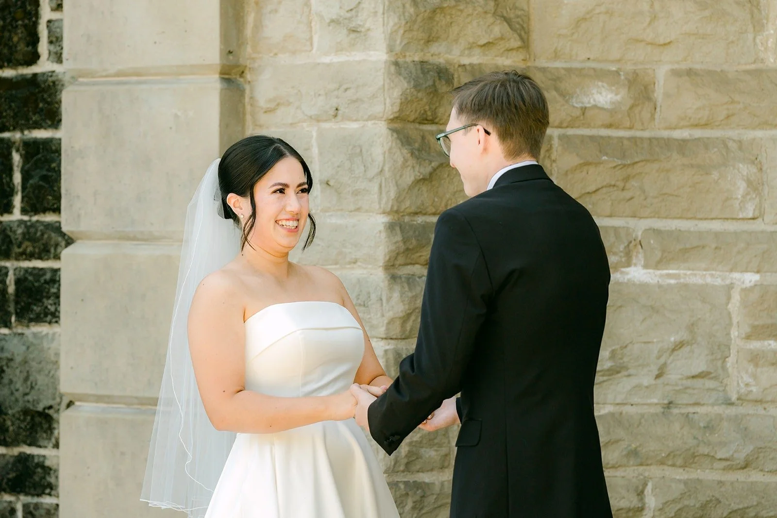 Brianna and Nik holding hands after their first look